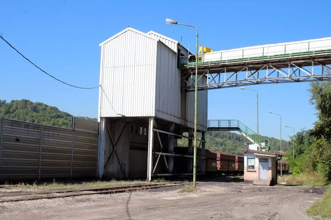 The coal loading bunker with rail wagons positioned beneath it