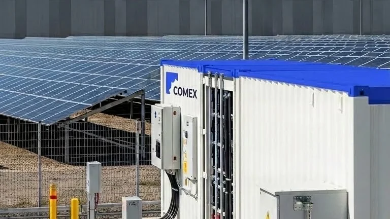 Comex-branded battery container installed beside a solar array